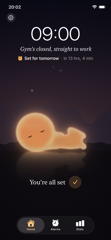 Suncall's home screen at night: an alarm set for 09:00 with the reason &ldquo;Gym's closed, straight to work&rdquo;, counting down to tomorrow, and the sun character asleep on the ground.